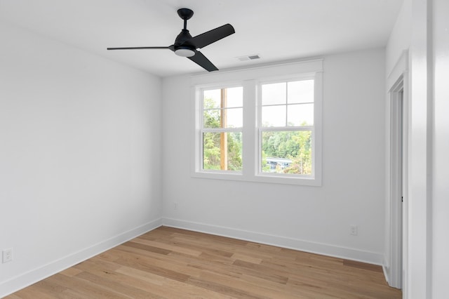 unfurnished room featuring ceiling fan and light wood-type flooring