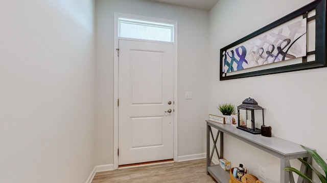 entrance foyer featuring light hardwood / wood-style floors