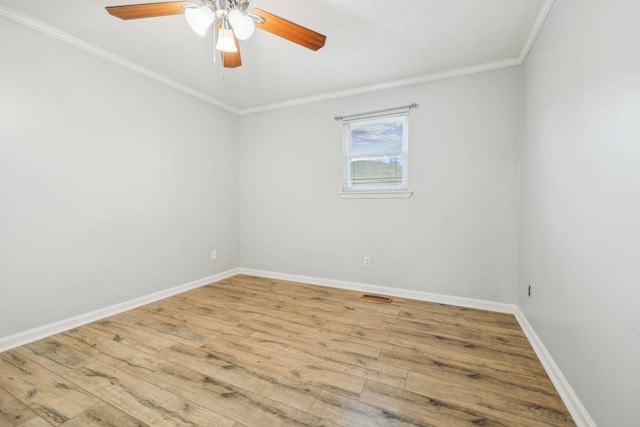 spare room featuring crown molding, ceiling fan, and light wood-type flooring