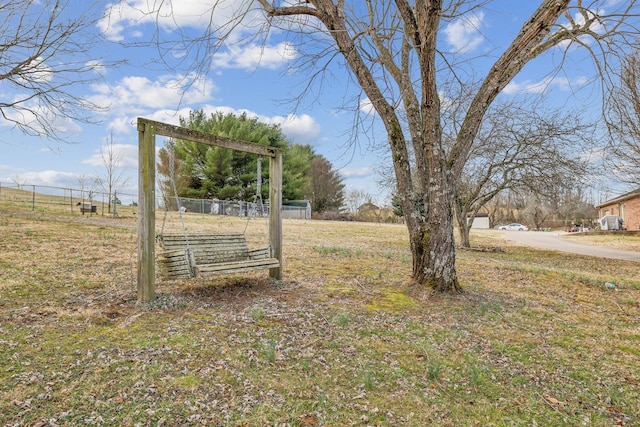 view of yard with a rural view