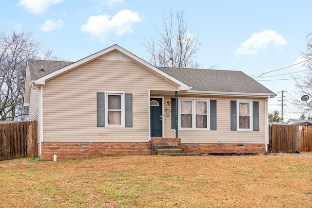 ranch-style house featuring a front yard