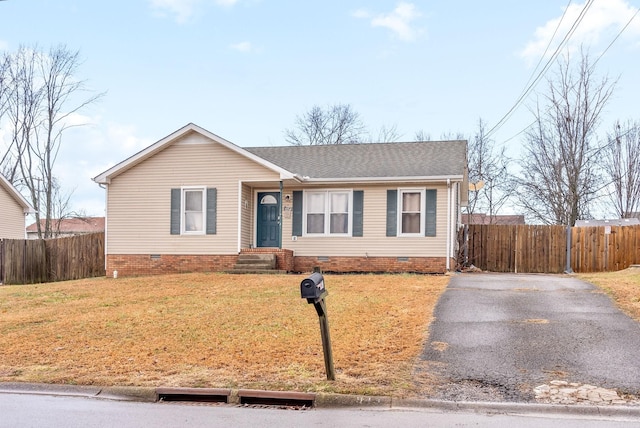 single story home with a front yard