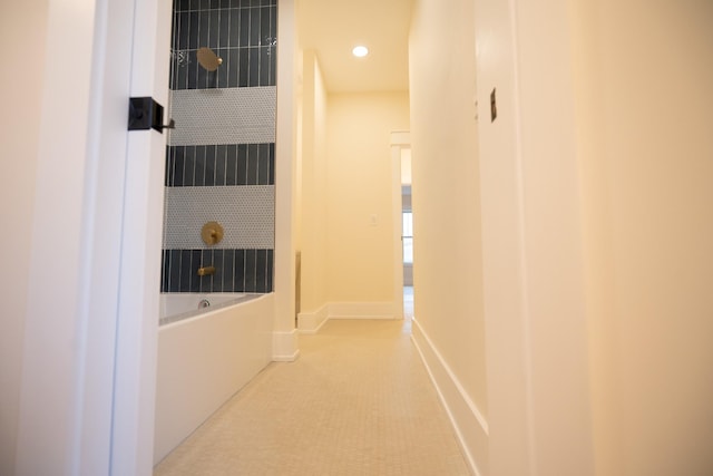 hallway featuring tile patterned floors