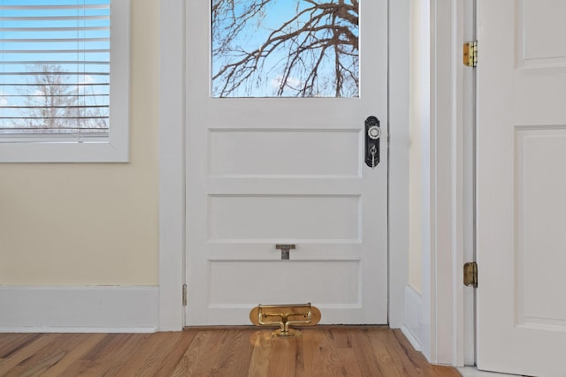 interior details with hardwood / wood-style flooring