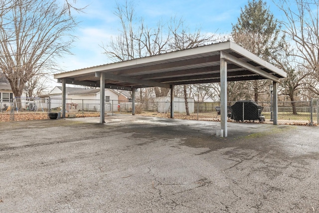 view of parking with a carport