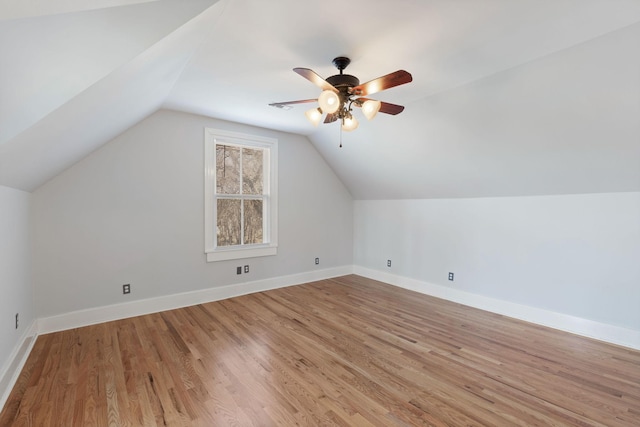 bonus room with ceiling fan, lofted ceiling, and light hardwood / wood-style floors