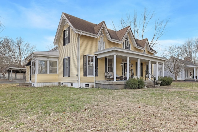 view of front facade featuring a porch and a front yard