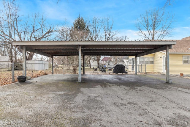 view of parking with a carport