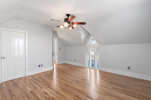 bonus room with ceiling fan, lofted ceiling, and light hardwood / wood-style flooring