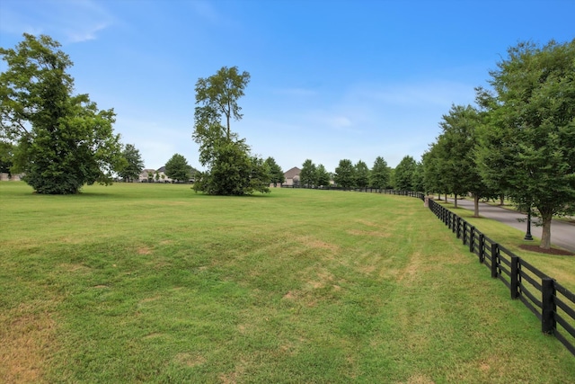 view of yard with a rural view