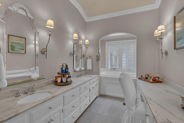 bathroom with ornamental molding and vanity