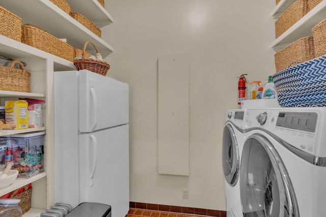 washroom with washer / clothes dryer