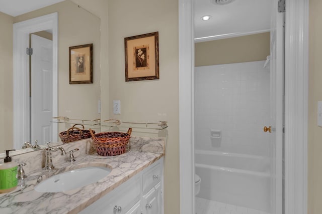 bathroom with visible vents, shower / bathing tub combination, vanity, and toilet