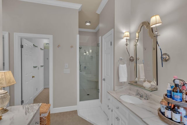 bathroom with walk in shower, vanity, and crown molding