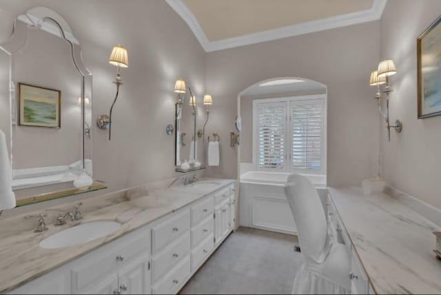 full bathroom with double vanity, crown molding, and a sink