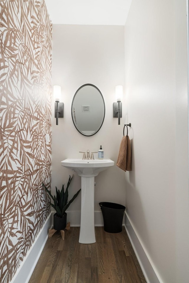 bathroom with wood-type flooring