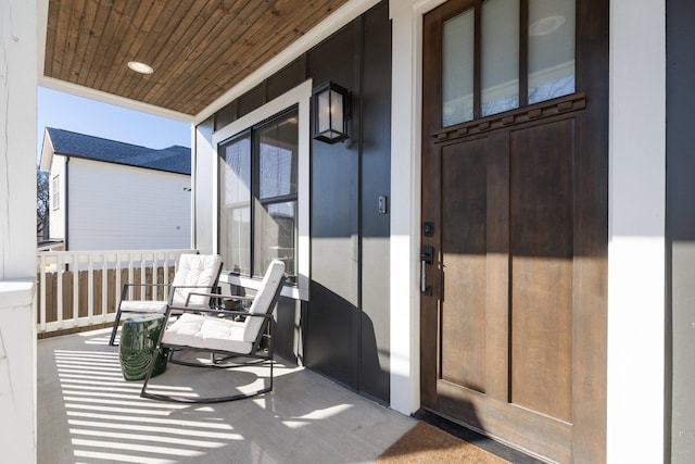 doorway to property featuring covered porch