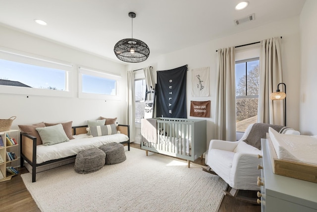 bedroom featuring dark hardwood / wood-style floors