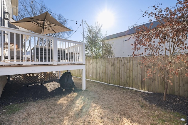 view of yard with a deck