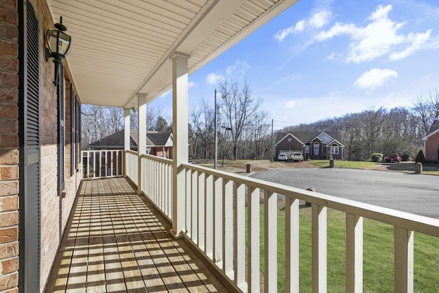 balcony featuring a porch