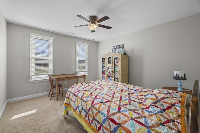 bedroom with light colored carpet and ceiling fan