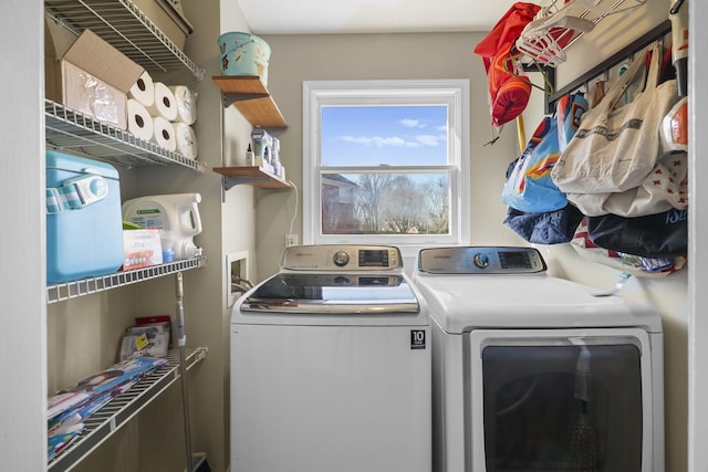 laundry room with washing machine and dryer