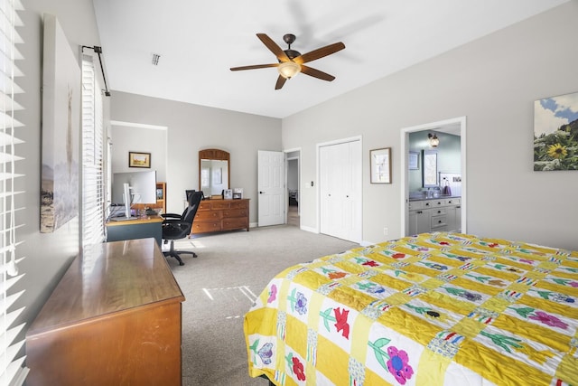 bedroom with connected bathroom, a closet, ceiling fan, and carpet flooring