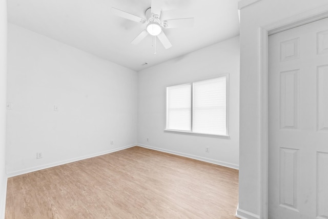 unfurnished room with ceiling fan and light hardwood / wood-style floors