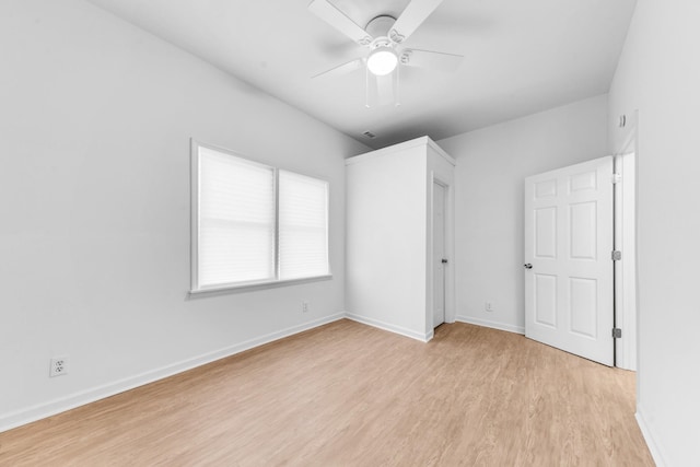 unfurnished bedroom with light hardwood / wood-style floors and ceiling fan