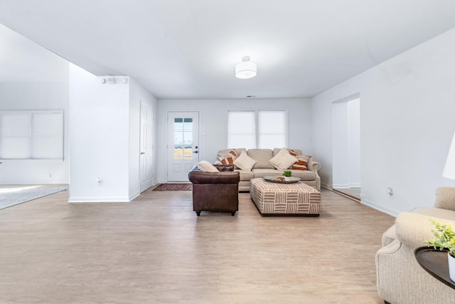 living room featuring light wood-type flooring