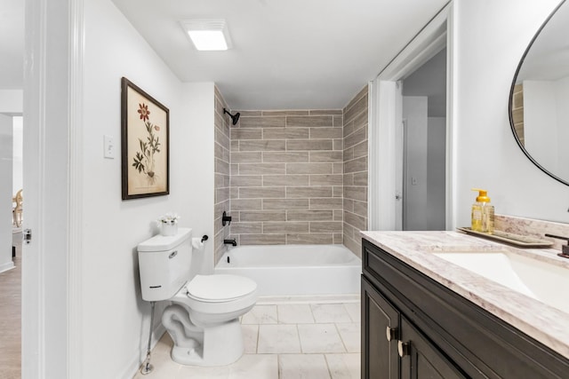 full bathroom with vanity, toilet, and tiled shower / bath