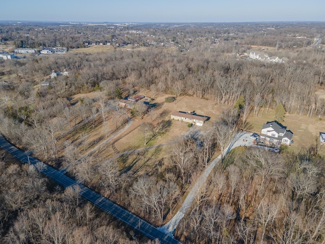 birds eye view of property featuring a rural view