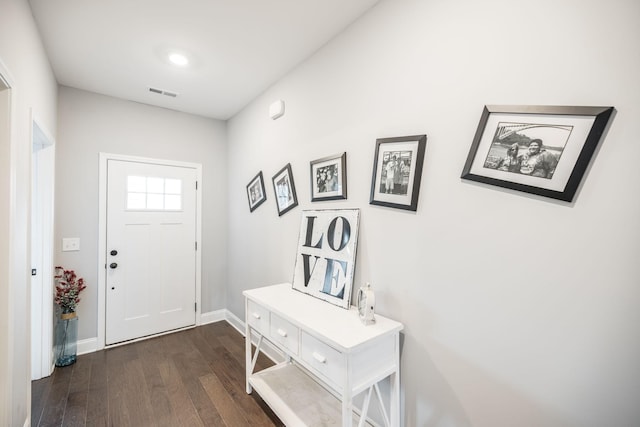 foyer entrance with dark wood-type flooring