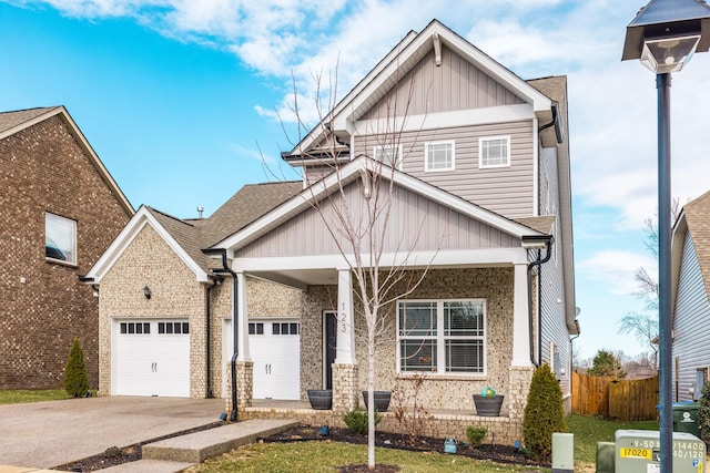 craftsman house featuring a garage and covered porch