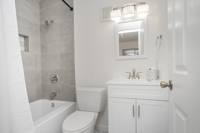 full bathroom featuring vanity, toilet, and shower / tub combo