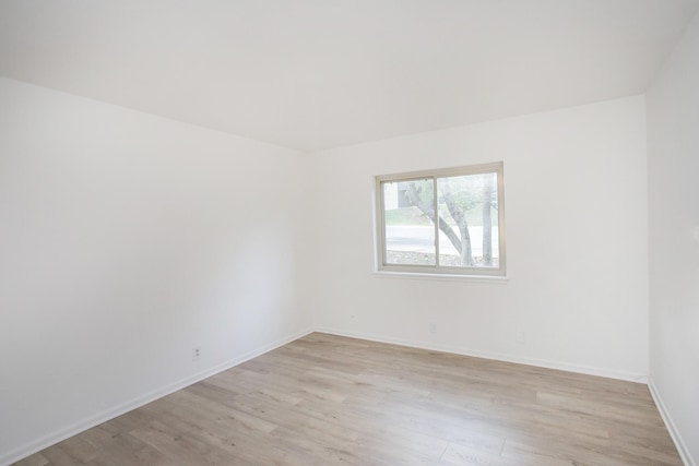 unfurnished room featuring light wood-type flooring