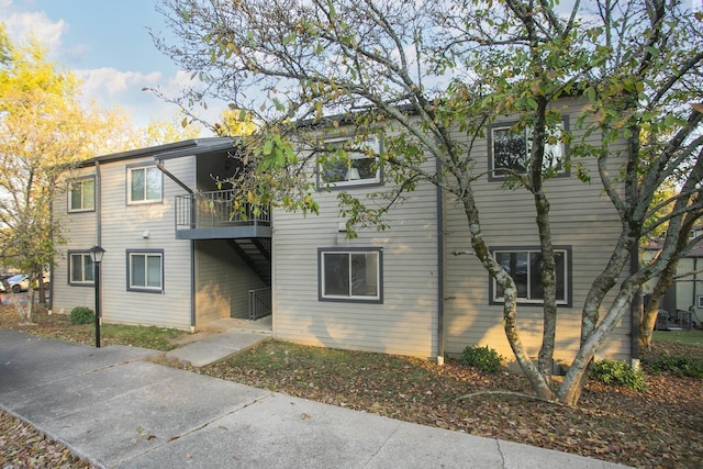 rear view of house featuring a balcony