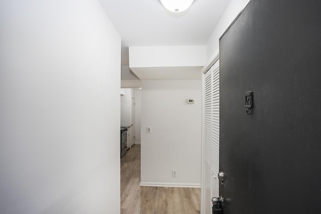 hall featuring light hardwood / wood-style floors