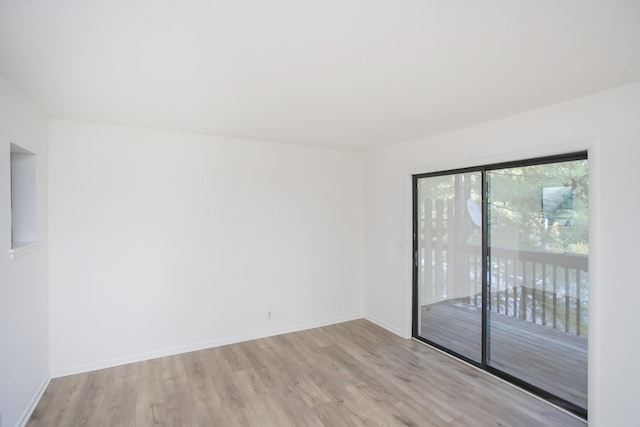 empty room with light wood-type flooring