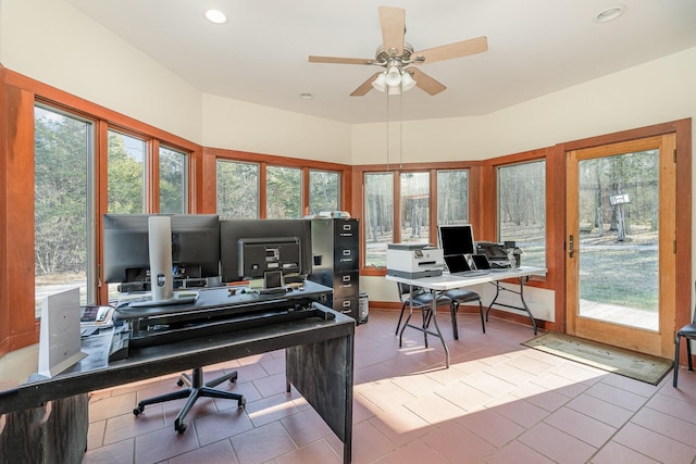 office area with ceiling fan and light tile patterned flooring