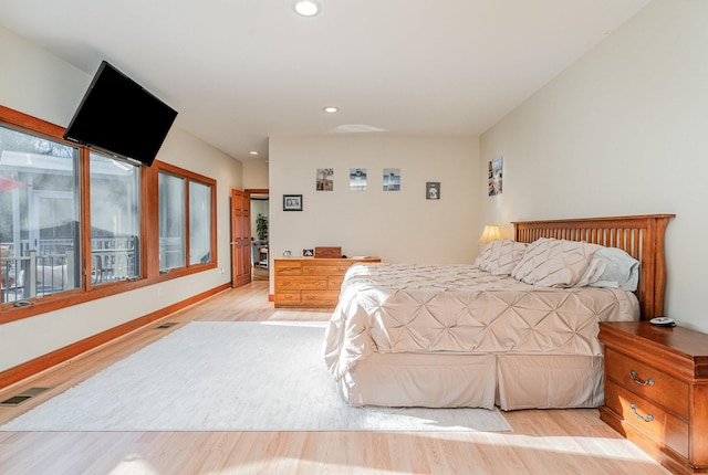 bedroom featuring light hardwood / wood-style floors