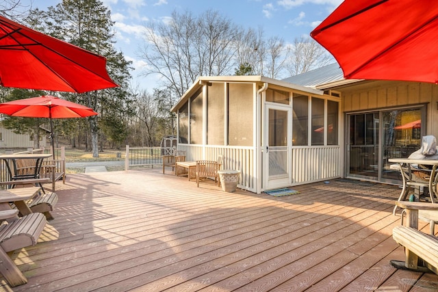 deck featuring a sunroom