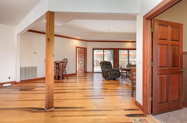 entryway with light hardwood / wood-style flooring