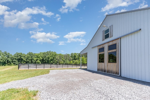 view of patio featuring an outbuilding