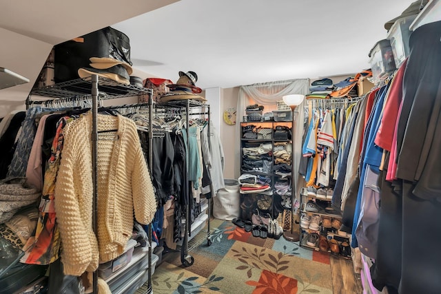 spacious closet featuring hardwood / wood-style flooring