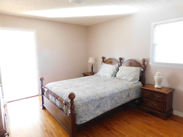 bedroom with light hardwood / wood-style floors