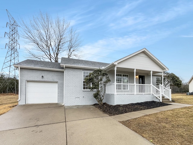 ranch-style house featuring a porch and a garage