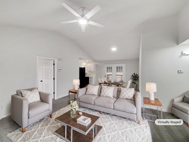 living room with lofted ceiling, light colored carpet, and ceiling fan