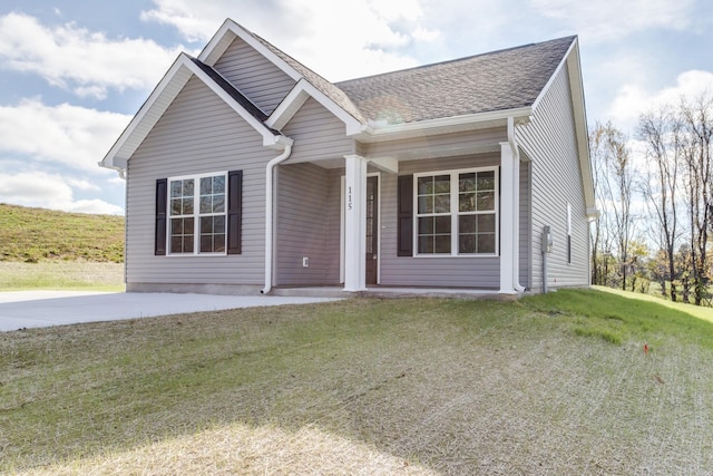 view of front of property with a front lawn