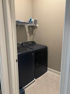 laundry room with independent washer and dryer